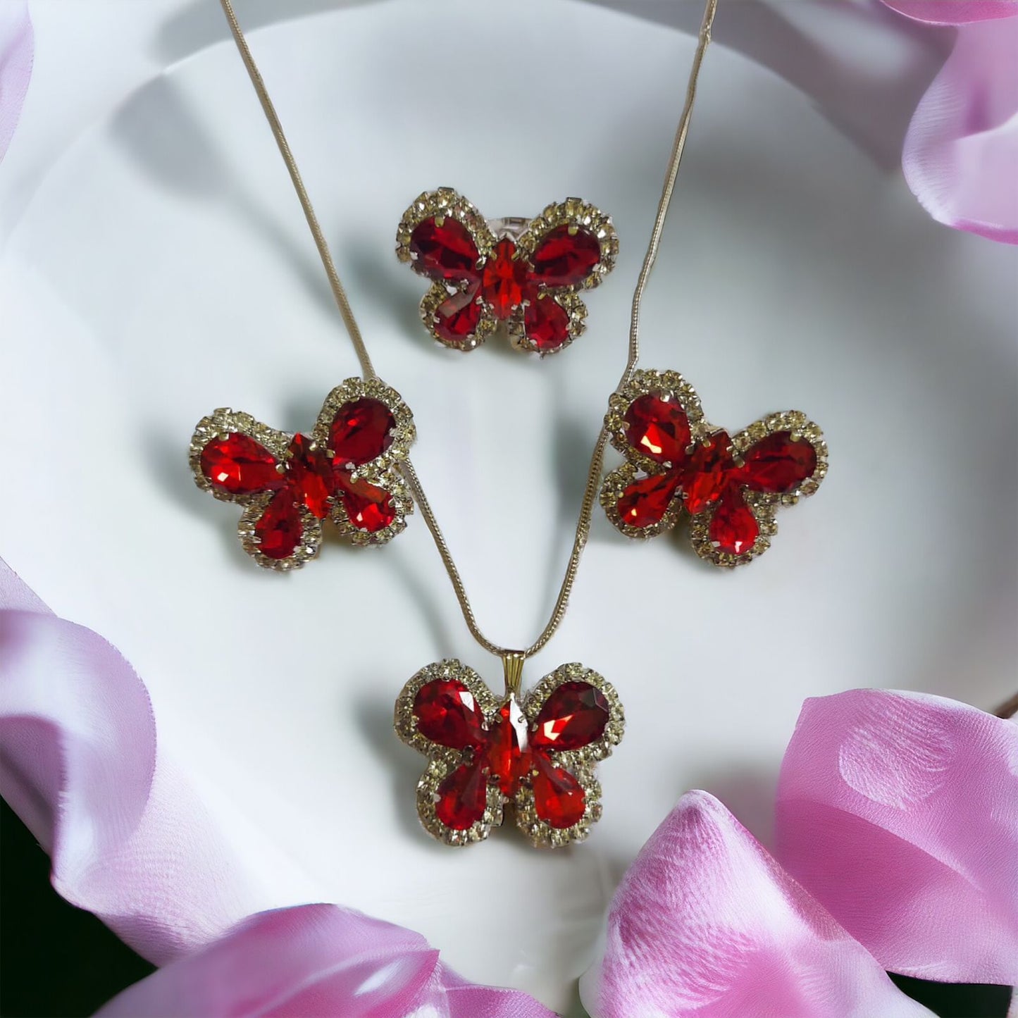 Glass Stone Butterfly pendent set with adjustable fingerring and earrings Red in color