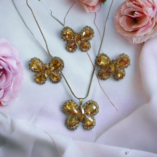 Glass Stone Butterfly pendent set with adjustable fingerring and earrings Golden color